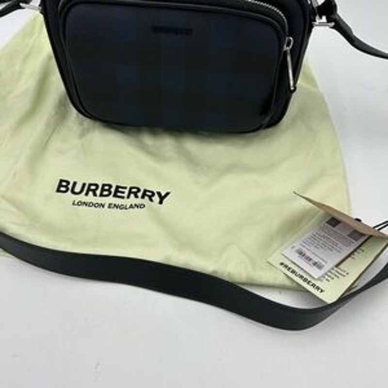 Men's Burberry, check messenger bag in navy blue. Adjustable shoulder strap.