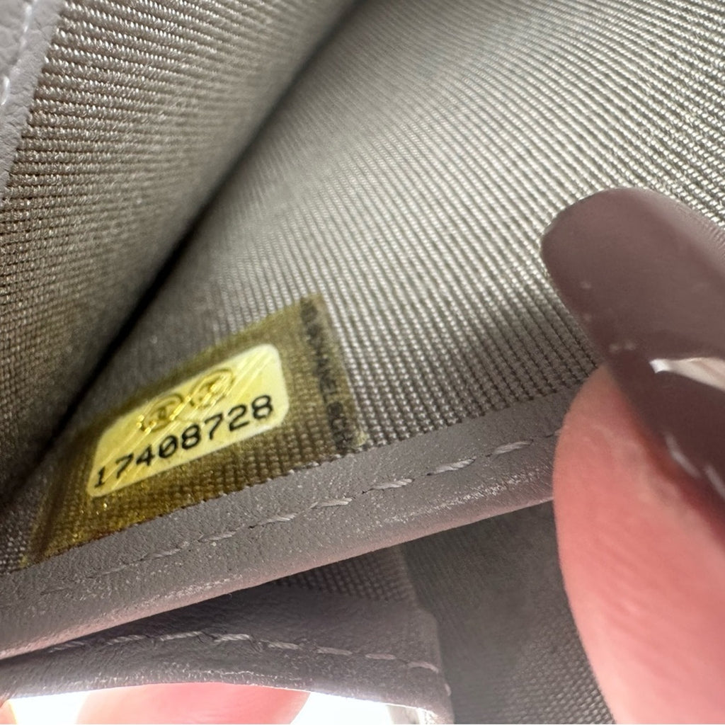 Women’s Chanel zip around long wallet, gray quilted pattern ombre holo present