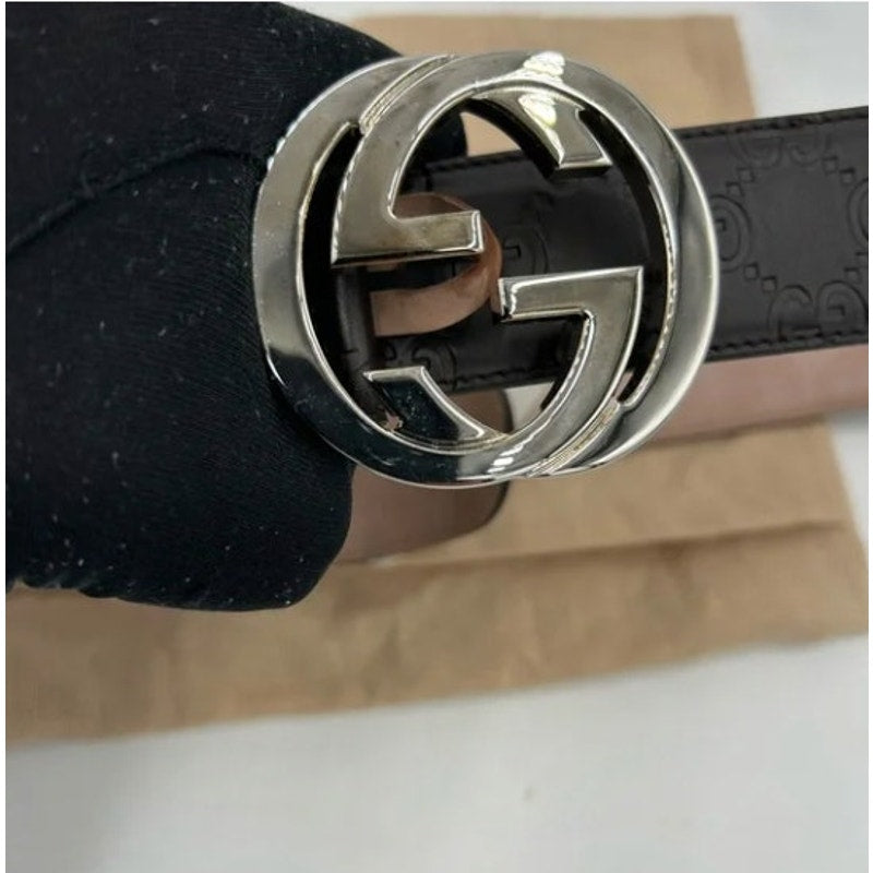 Men's Gucci signature leather embossed interlocking G buckle belt size 38/95 cm