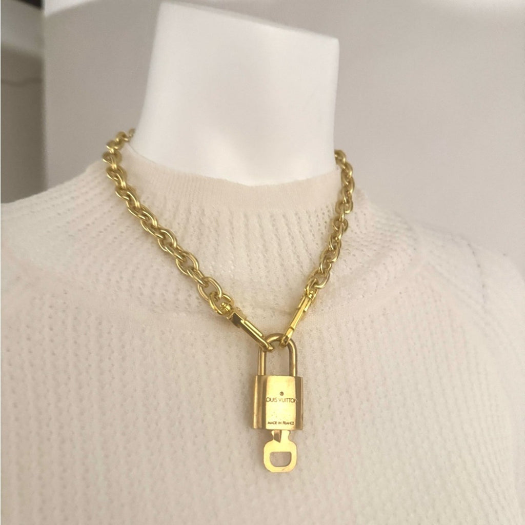 Louis Vuitton Gold Padlock #319 with LV branded chain that can be purse chain